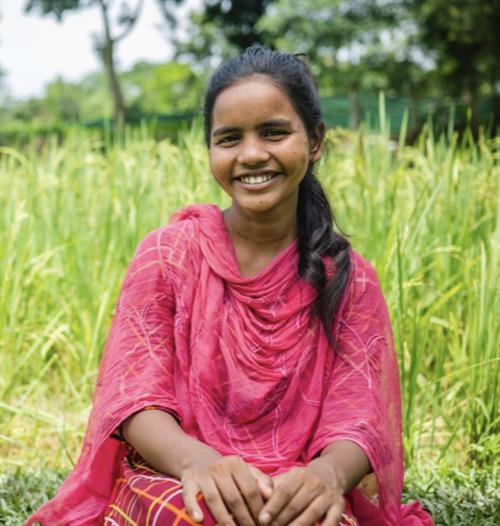 Girl smiling for a picture