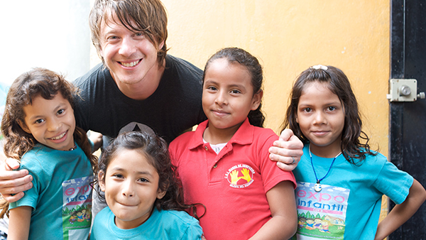 Mike Donehey visiting children in Honduras in 2014.