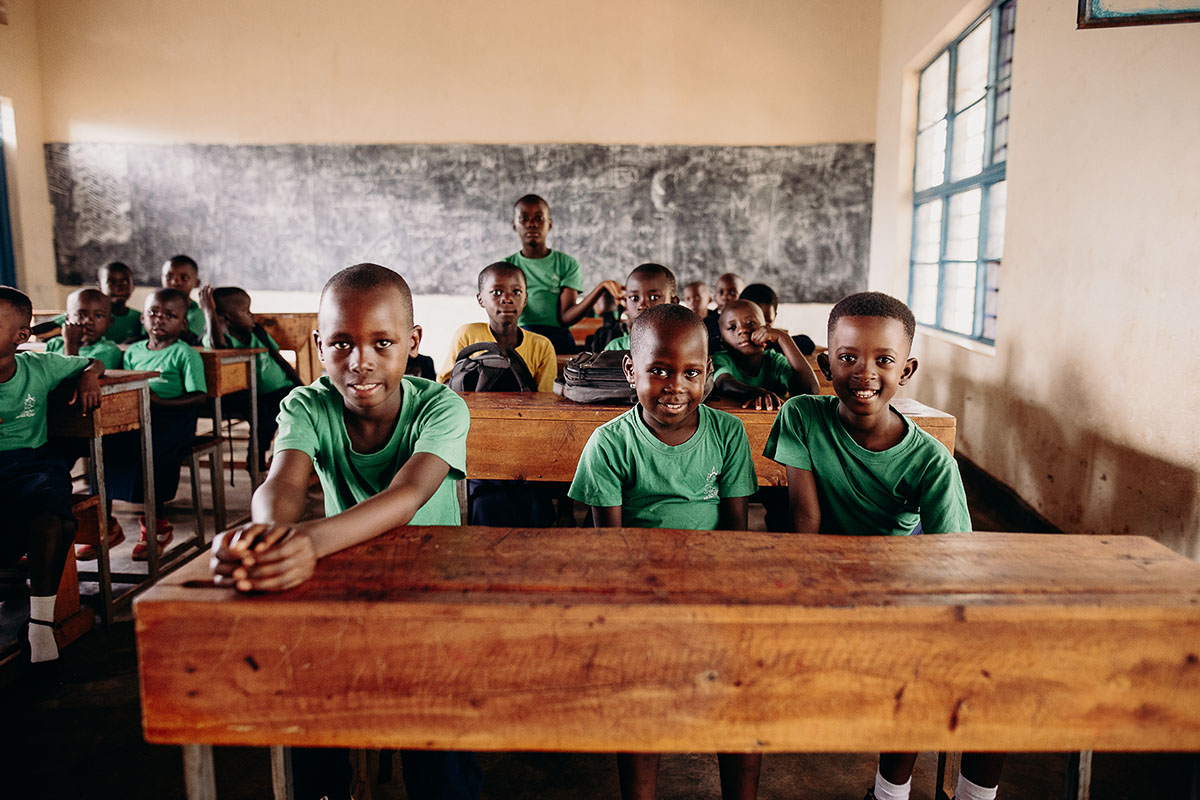 children sit in their classroom