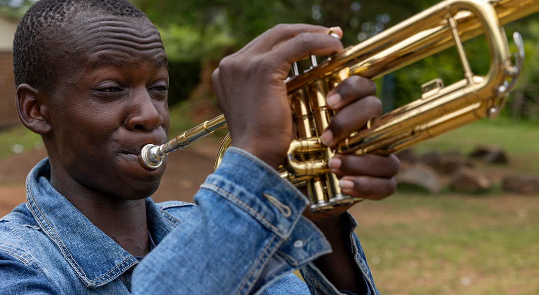 Joseph from Kenya enjoys playing the trumpet.