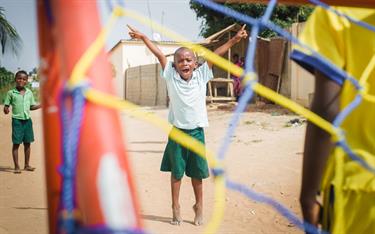 Segnon plays soccer at his Compassion center in Togo.