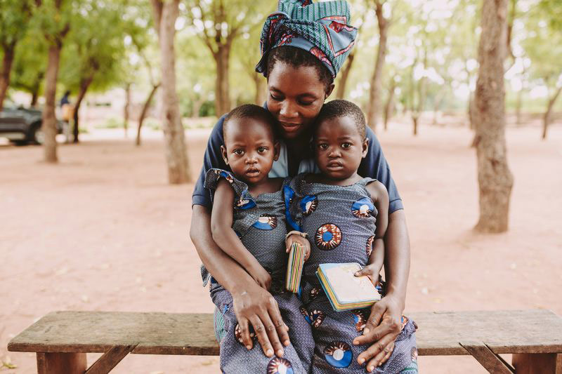https://www.compassion.com/Images/togo-family-motherbooks.jpg