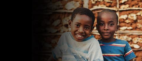 Children smiling and playing outside