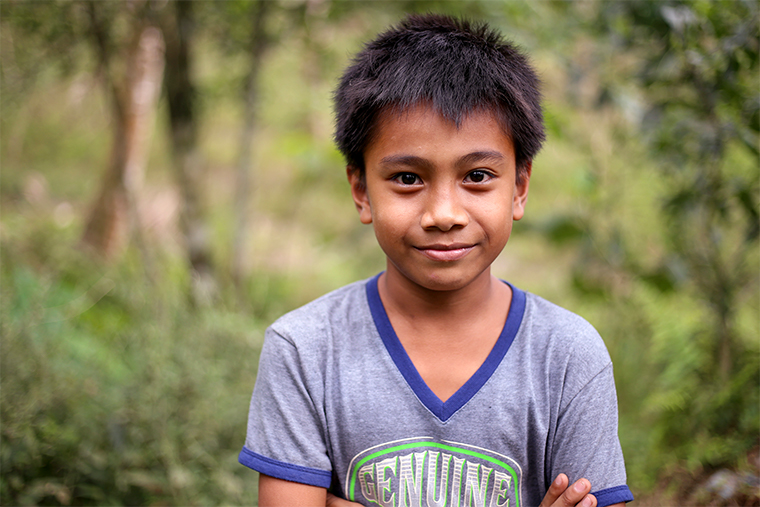 Portrait of Dominic smiling