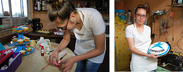 Verenice baking and holding a cake